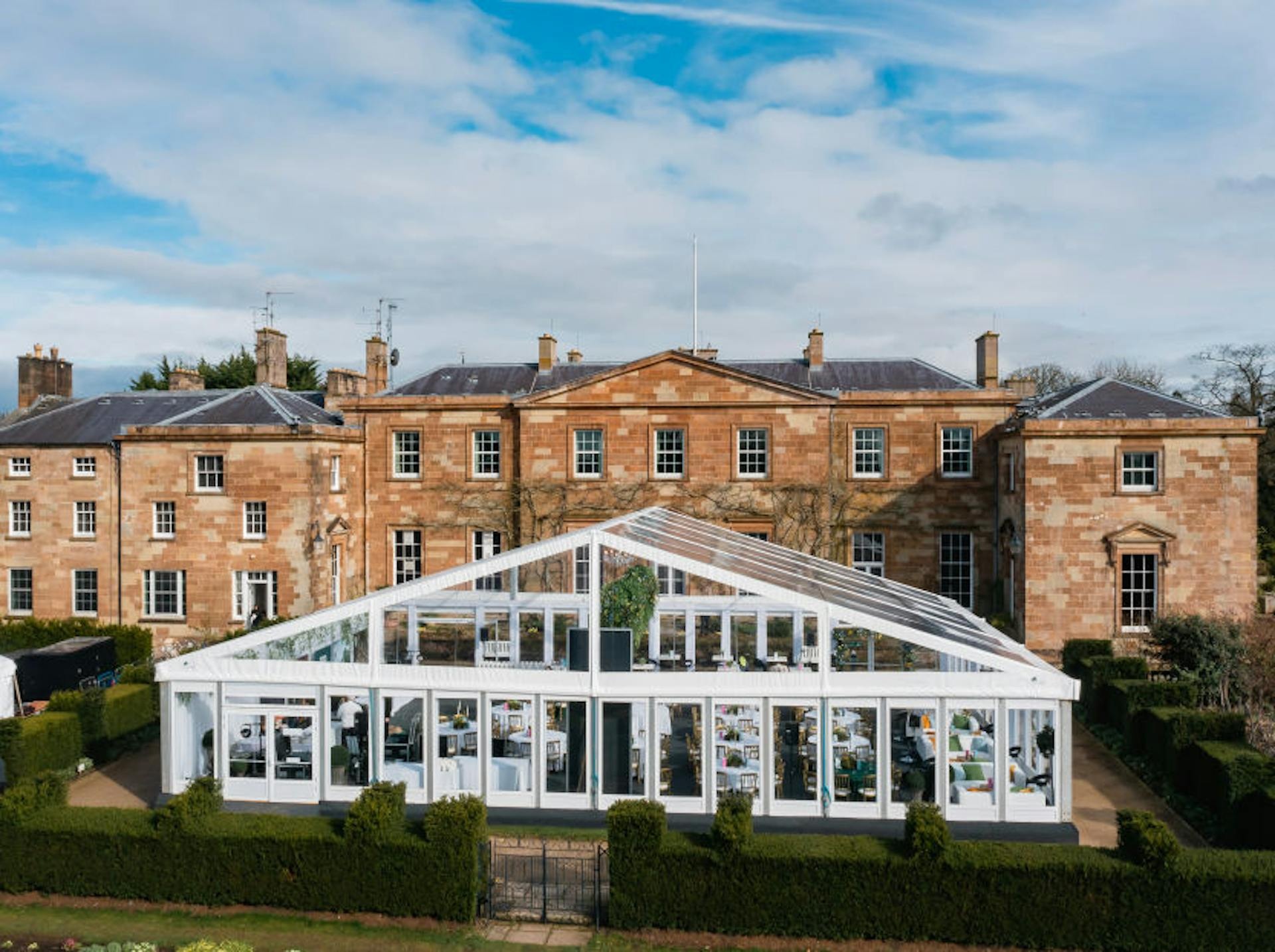 The castle's principal facade with the Victorian glass conservatory, Hillsborough Castle and Gardens
