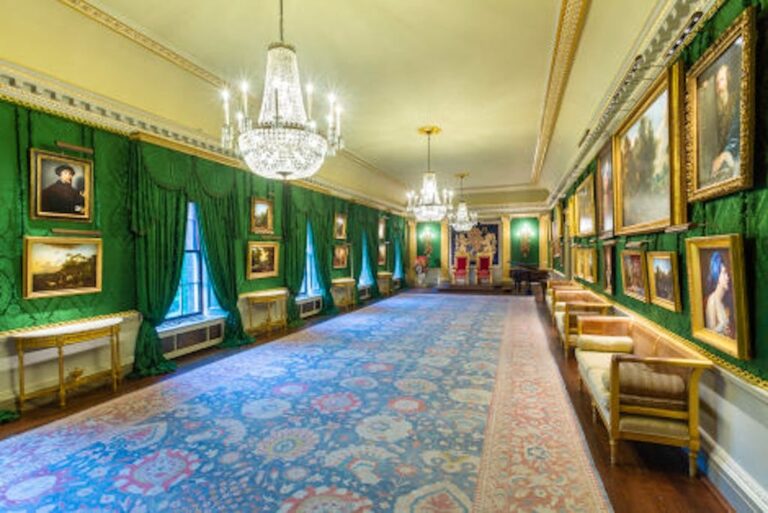 The State Drawing Room gallery, paintings above a blue patterned carpet, Hillsborough Castle and Gardens