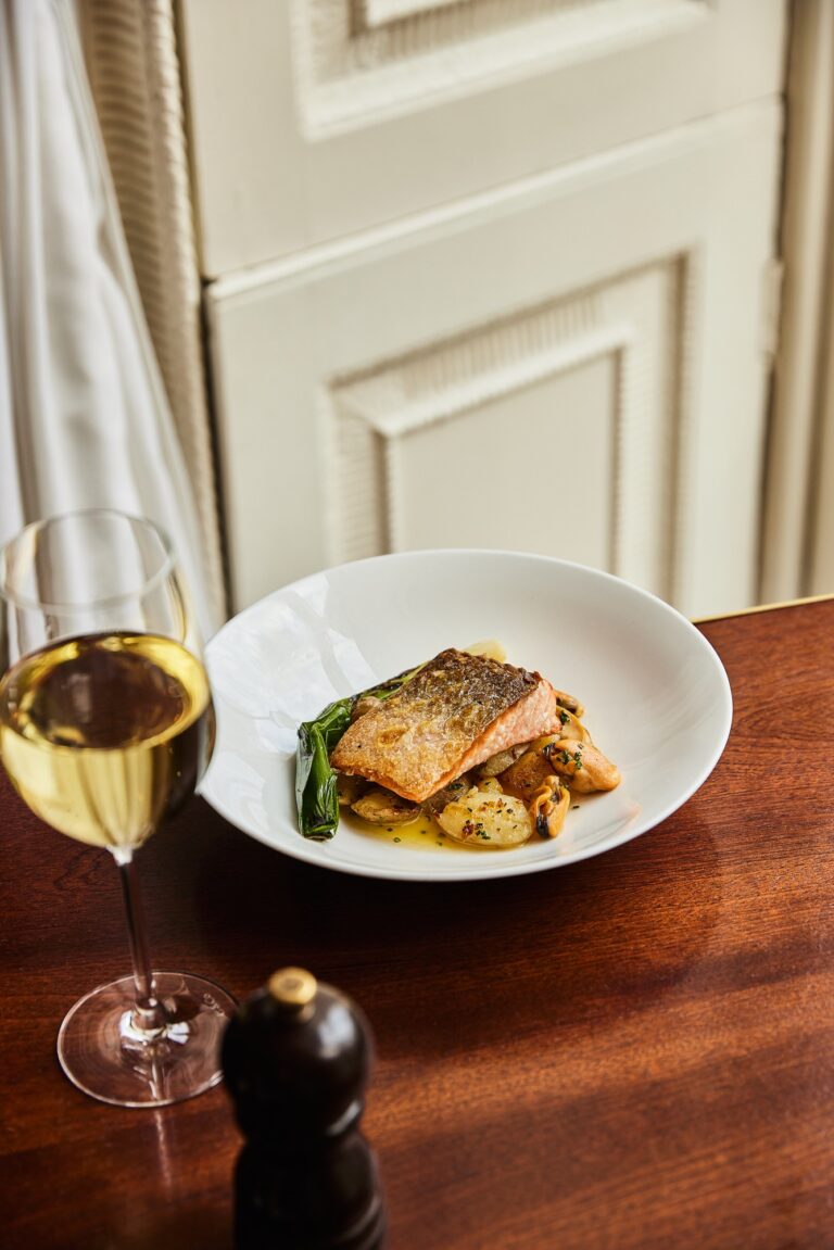 A fish course served with white wine, Home House