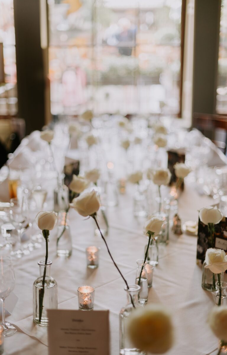 A table laid with roses and candles, Home House
