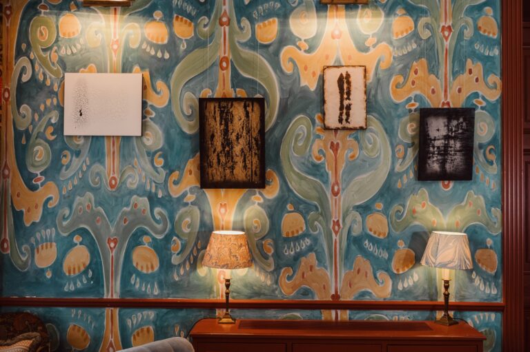 A room with patterned blue wallpaper, Home House