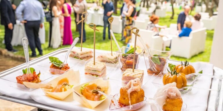 Wedding canapes served in the garden, Hotel Alpha
