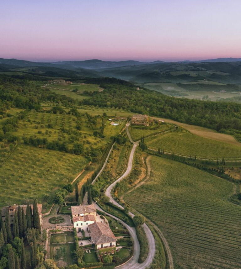 The estate at dawn: vineyard roads and misty Chianti hills, Hotel Le Fontanelle