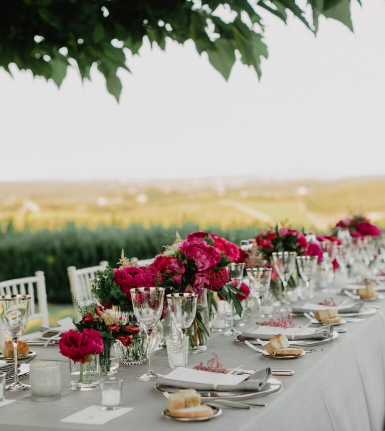 A wedding table: red peonies against the vineyard, Hotel Le Fontanelle