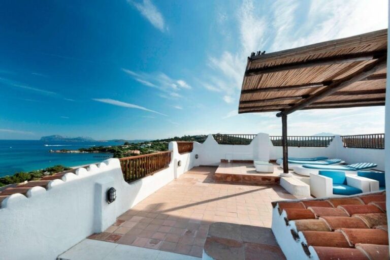 A roof terrace over the bay, Hotel Romazzino, A Luxury Collection Hotel