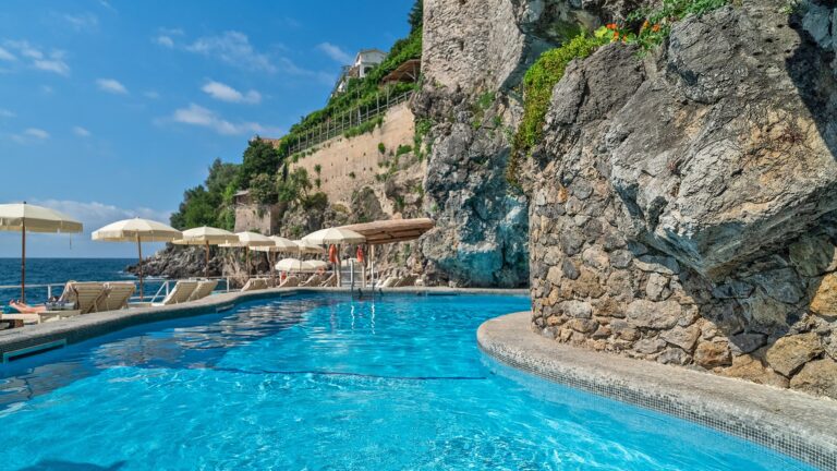 The salt water swimming pool at the foot of the cliff, Hotel Santa Caterina