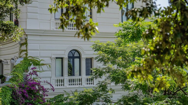 Arched windows and balconies on the hotel facade, Hotel Santa Caterina