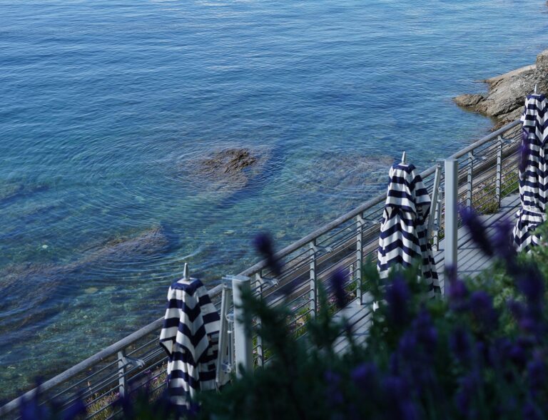 A sea-view terrace with striped cushions and lavender, Hotel Tresanton