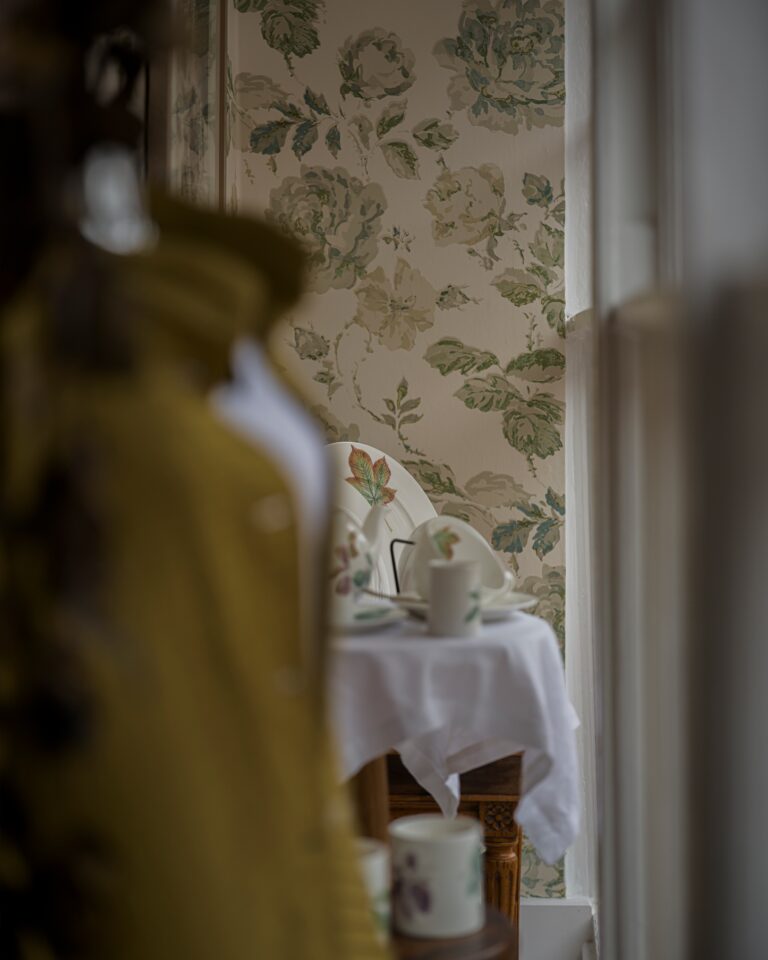 A bedroom detail, a robe and a morning tea tray, Hotel Tresanton