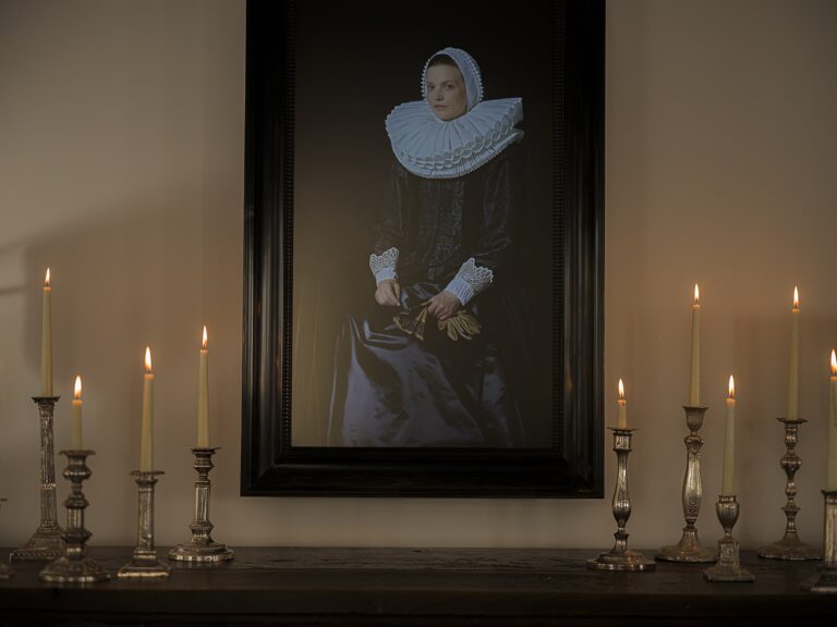 A candlelit mantel beneath an old portrait, Hotel Tresanton