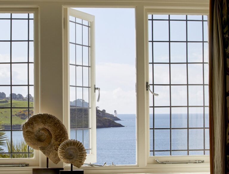 An open window to the sea, with nautilus shells on the sill, Hotel Tresanton