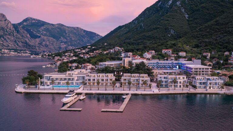 The resort and marina at dusk with the mountains behind, Hyatt Regency Kotor Bay Resort