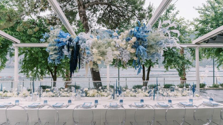 A long wedding table with blue and white flowers at the Lighthouse restaurant, Hyatt Regency Kotor Bay Resort