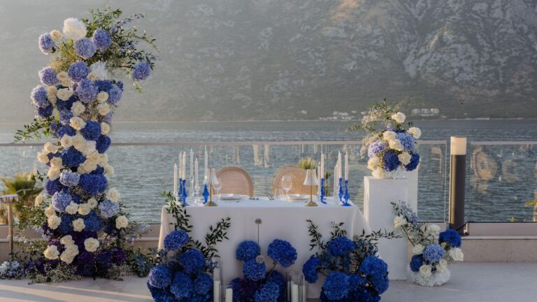 The Hedonist rooftop wedding table with blue flowers, Hyatt Regency Kotor Bay Resort