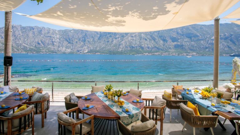 Tables laid on the beach under a canopy, Hyatt Regency Kotor Bay Resort