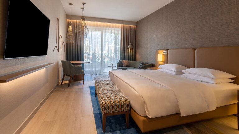 A king bedroom with a pool view, Hyatt Regency Kotor Bay Resort