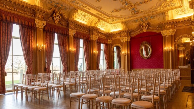 The Banqueting Room set for a ceremony, gilded coffered ceiling and red silk walls, Hylands Estate