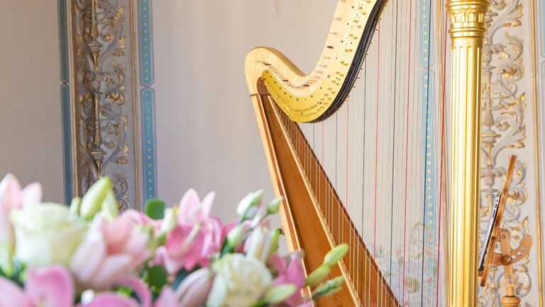A harp and pink tulips in the house before the ceremony, Hylands Estate
