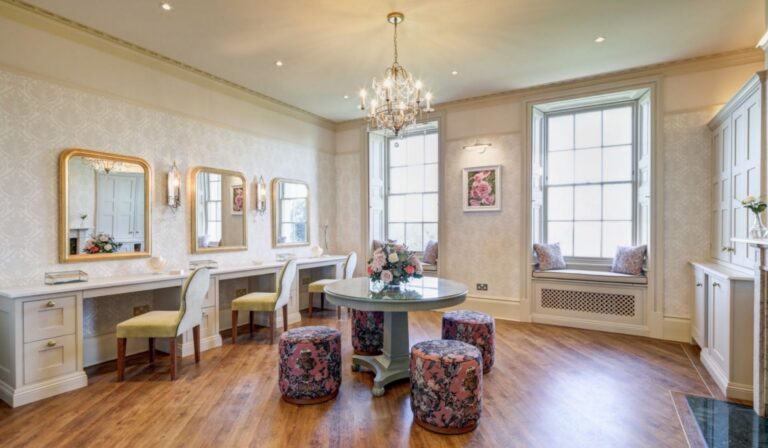 A getting-ready suite with beauty stations, mirrors and velvet seating, Hylands Estate