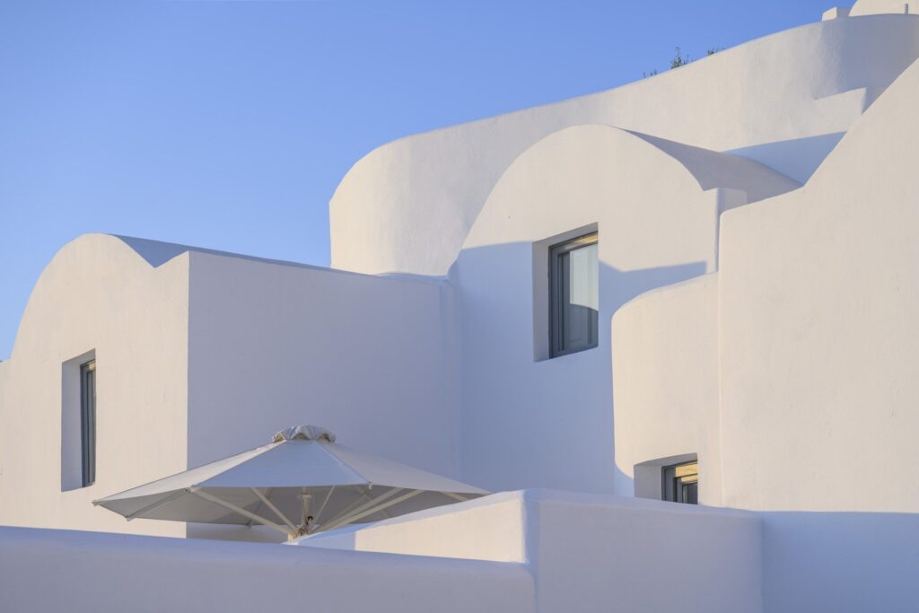 Whitewashed cave houses and domes against the sky, Ikies Traditional Houses