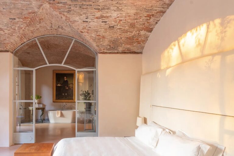 The Greenhouse Suite, beneath original brick vaulting, Il Salviatino