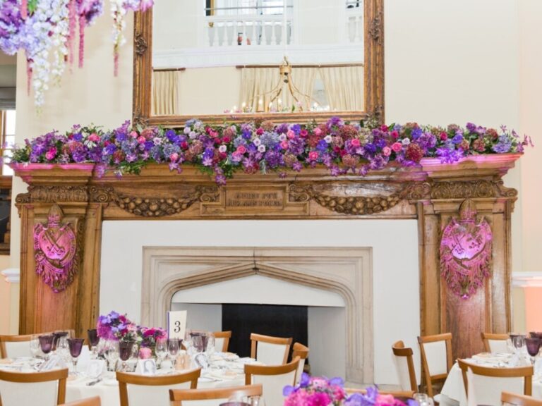 A floral installation dresses the fireplace mantel, Farnham Castle, In Water Flowers