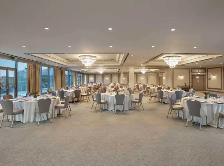A ballroom with glazed side facing the park, set for a banquet, InterContinental Istanbul