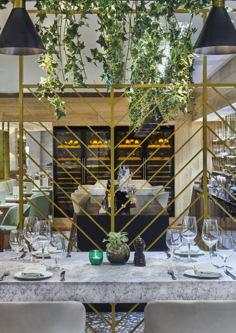 Theo Randall Cucina Italiana, with brass trellis screens hung with greenery and a wine wall, InterContinental London Park Lane
