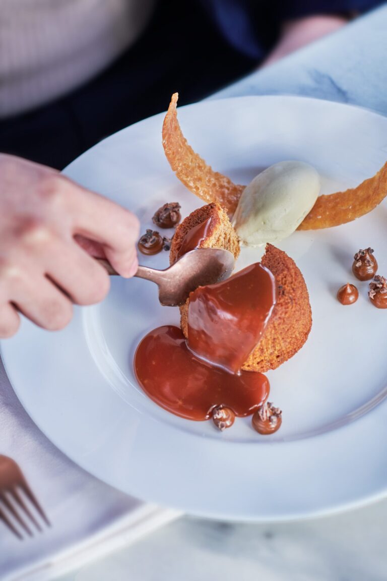 Sticky toffee pudding with toffee sauce, a quenelle of ice cream and a tuile, InterContinental London Park Lane