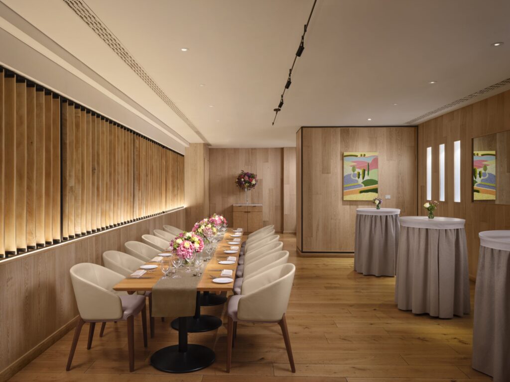 The Amalfi private dining room at Theo Randall Cucina Italiana with a long table and poseur tables for drinks, InterContinental London Park Lane