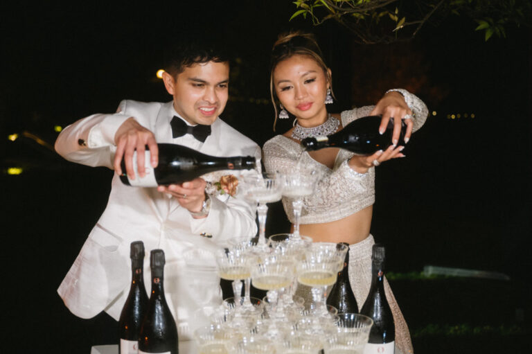 Pouring the champagne tower together, Iole Criscitiello