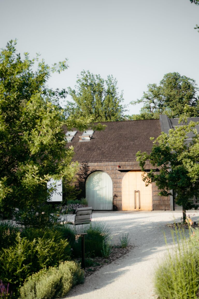Stone outbuilding on the garden path, Iris Orangerie