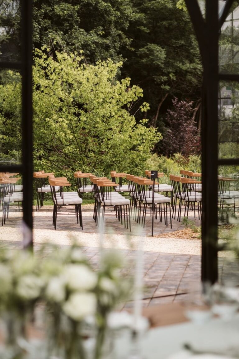 Outdoor dining area beneath the trees, Iris Orangerie