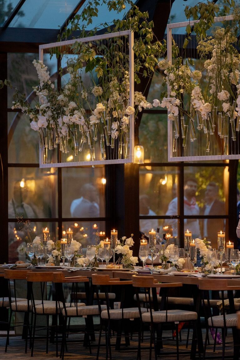 Dinner tables with suspended floral frames, Iris Orangerie