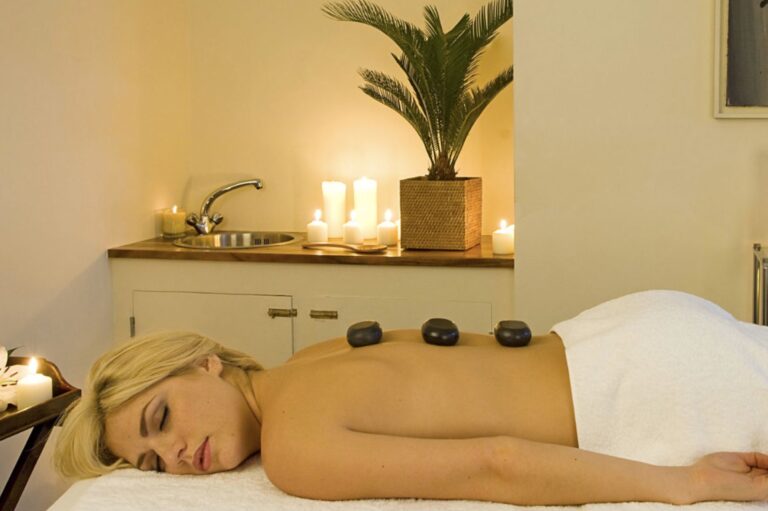 The secret spa, a hot-stone treatment by candlelight with a palm alongside, Iscoyd Park