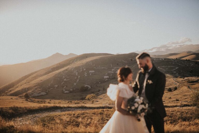 A bride and groom on a golden-hour hillside in the Abruzzo highlands, Italian Event Planners