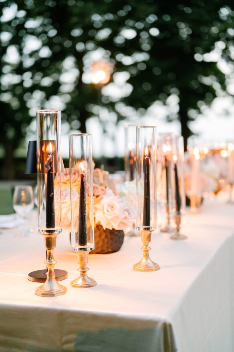 Candles and tapers on a dressed reception table, Italian Wedding