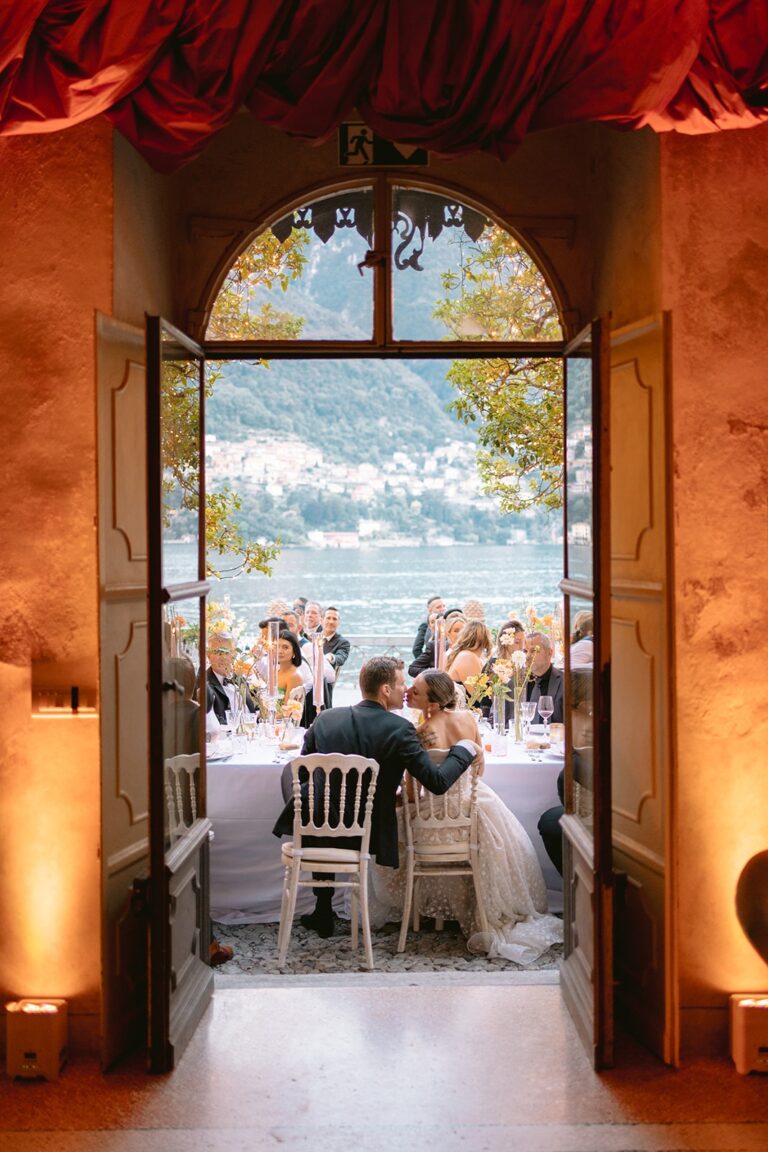 Villa doors opening onto the lake and dining room, Italian Wedding