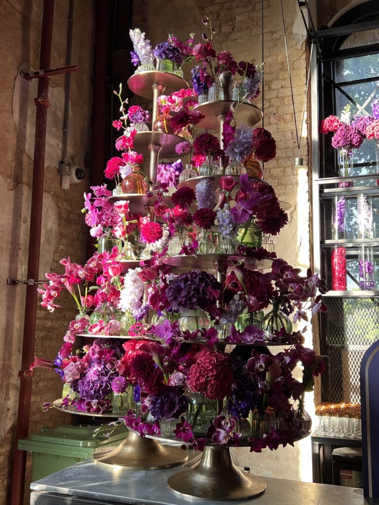 A sculptural tiered flower tower, built in the studio, Jamie Aston