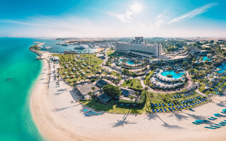 Aerial view of the resort, its beach and gardens, Jebel Ali Golf Resort