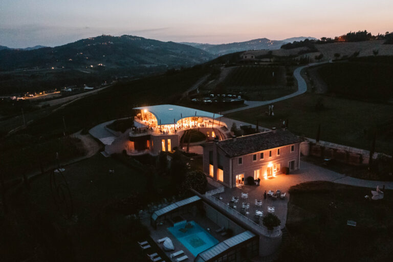 Tenuta Biodinamica Mara, San Clemente, lit up at dusk in the hills inland from Rimini, Joy Wedding