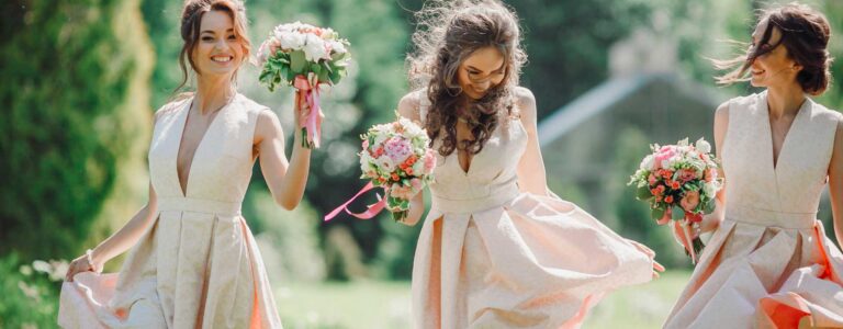 Bridesmaids with bouquets in a garden, Julia Event