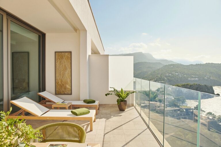 A suite terrace with sun loungers and views over the mountains, Jumeirah Port Soller Hotel & Spa