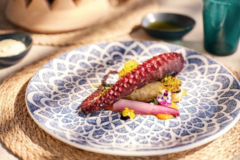 Grilled octopus dressed on a hand-painted Mallorcan plate, Jumeirah Port Soller Hotel & Spa