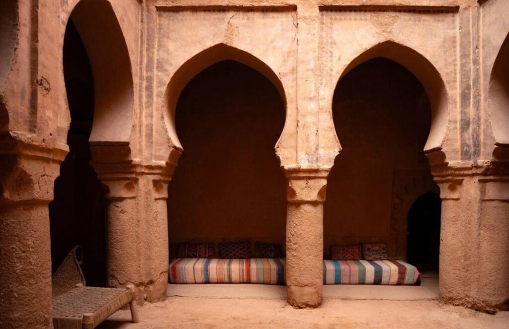 Courtyard arcade with a cushioned seating alcove, Kasbah des Caïds