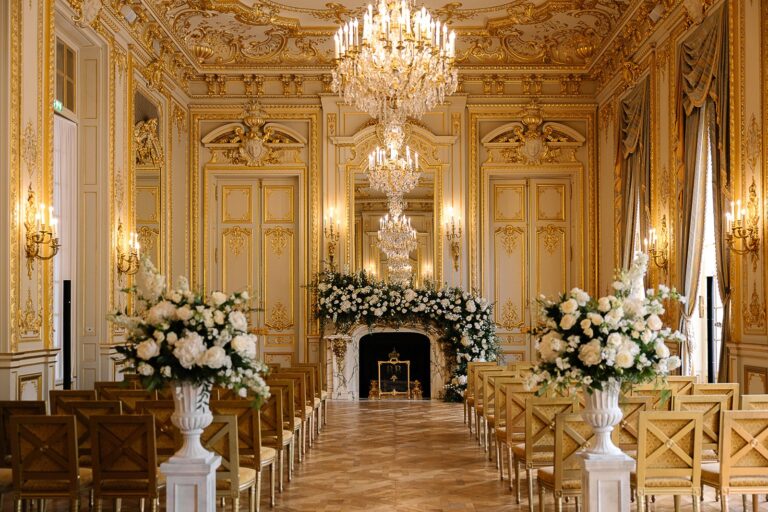 Ceremony aisle lined with chairs and white flowers in a gilded salon, Shangri-La Paris, Katerina Meyvial Wedding & Event Planner