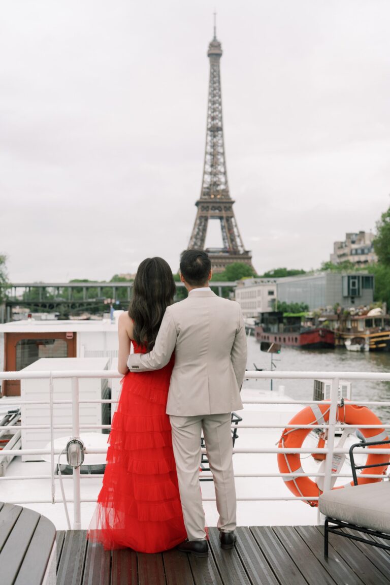 Couple on a boat on the Seine with the Eiffel Tower in view, Katerina Meyvial Wedding & Event Planner
