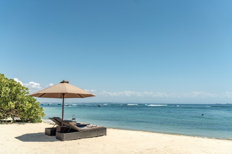 Sun lounger and parasol on the beach, Kayumanis Nusa Dua Private Villa and Spa