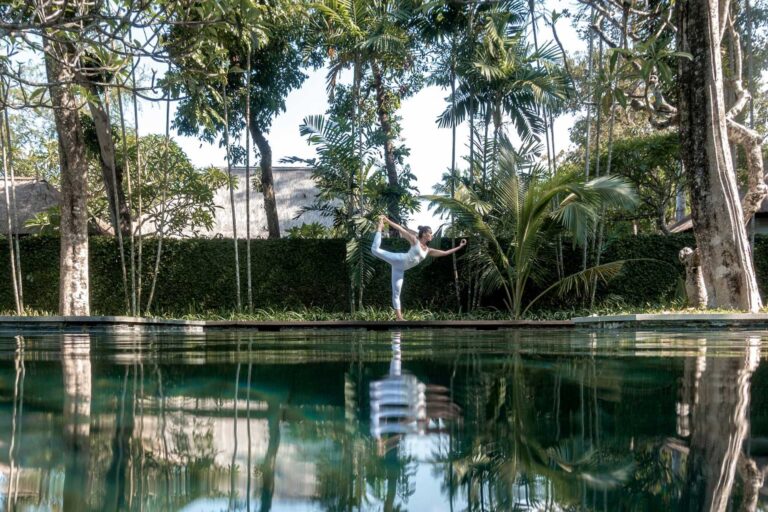 Yoga pose beside the pool, Kayumanis Nusa Dua Private Villa and Spa