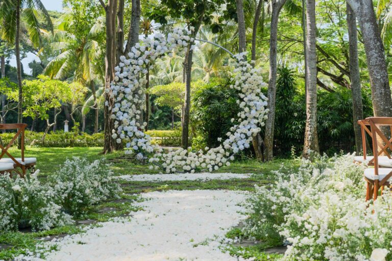 White floral decor on the Green Patio lawn, Kayumanis Nusa Dua Private Villa and Spa